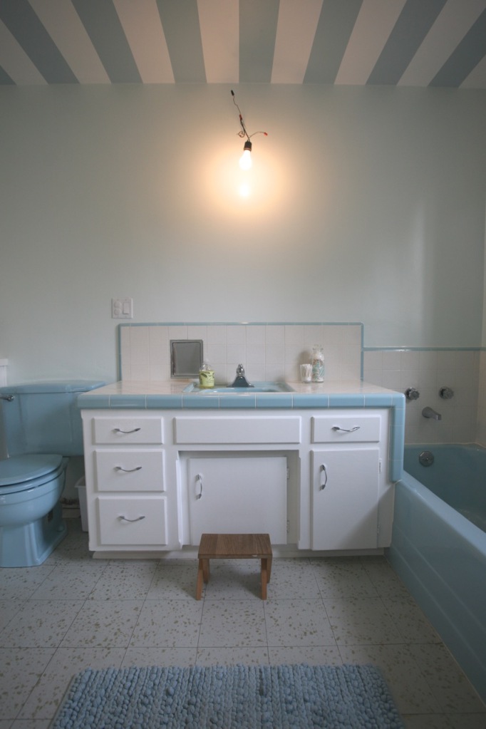 mid century blue bathroom sink cabinets striped ceiling white vintage retro 