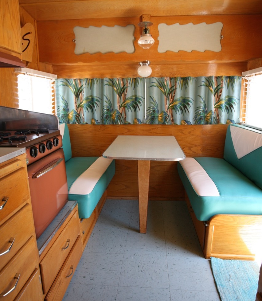 Shasta trailer vintage interior dinette vinyl upholstery barckcloth curtains blinds kitchen turquoise blue linoleum